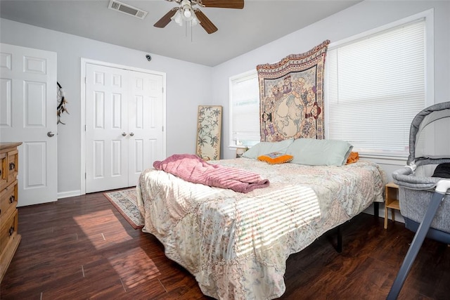 204 E Elder Ave, Duncan, OK 73533 - bedroom with wood finished floors, a closet, and a ceiling fan