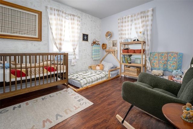 204 E Elder Ave, Duncan, OK 73533 - bedroom featuring wallpapered walls and wood finished floors
