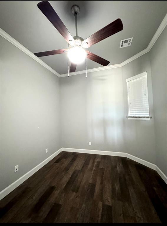 9125 NE Mustang Rd, Piedmont, OK 73078 - empty room featuring a ceiling fan, dark wood-type flooring, and ornamental molding