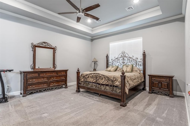9125 NE Mustang Rd, Piedmont, OK 73078 - carpeted bedroom featuring a tray ceiling, crown molding, a ceiling fan, and recessed lighting