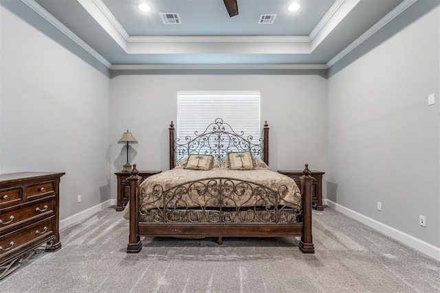 9125 NE Mustang Rd, Piedmont, OK 73078 - carpeted bedroom with a tray ceiling, ornamental molding, and recessed lighting