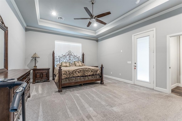 9125 NE Mustang Rd, Piedmont, OK 73078 - bedroom with ornamental molding, a tray ceiling, carpet, and a ceiling fan