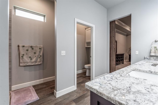 9125 NE Mustang Rd, Piedmont, OK 73078 - full bath with double vanity and wood finished floors