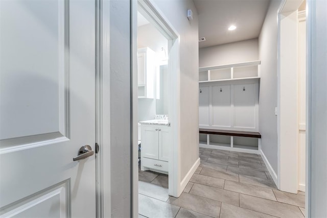 9125 NE Mustang Rd, Piedmont, OK 73078 - mudroom featuring light tile patterned floors and recessed lighting