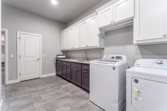 9125 NE Mustang Rd, Piedmont, OK 73078 - laundry room with washer and clothes dryer and cabinet space