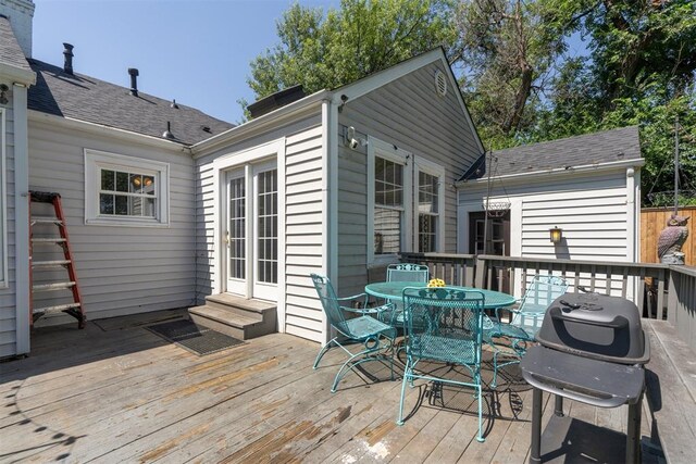 2625 Somerset Pl, Oklahoma City, OK 73116 - deck with outdoor dining area and entry steps