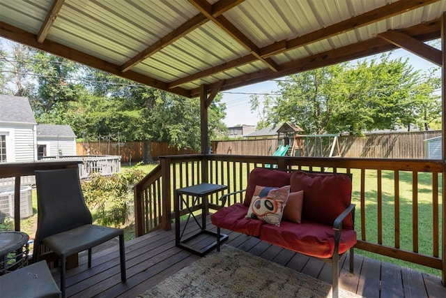 2625 Somerset Pl, Oklahoma City, OK 73116 - wooden deck featuring a fenced backyard and a playground