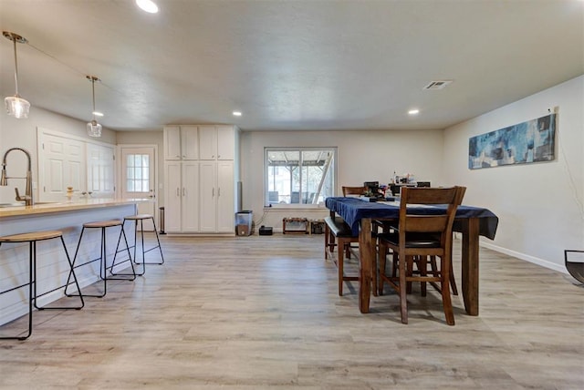 201 N English Dr, Moore, OK 73160 - dining area with light wood-type flooring and recessed lighting