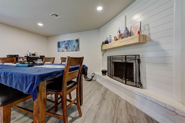 201 N English Dr, Moore, OK 73160 - dining area featuring wood finished floors, recessed lighting, and a fireplace