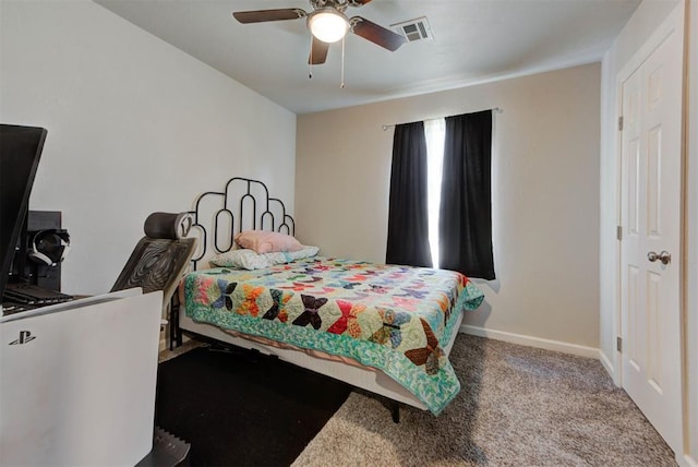 201 N English Dr, Moore, OK 73160 - bedroom with carpet floors and a ceiling fan