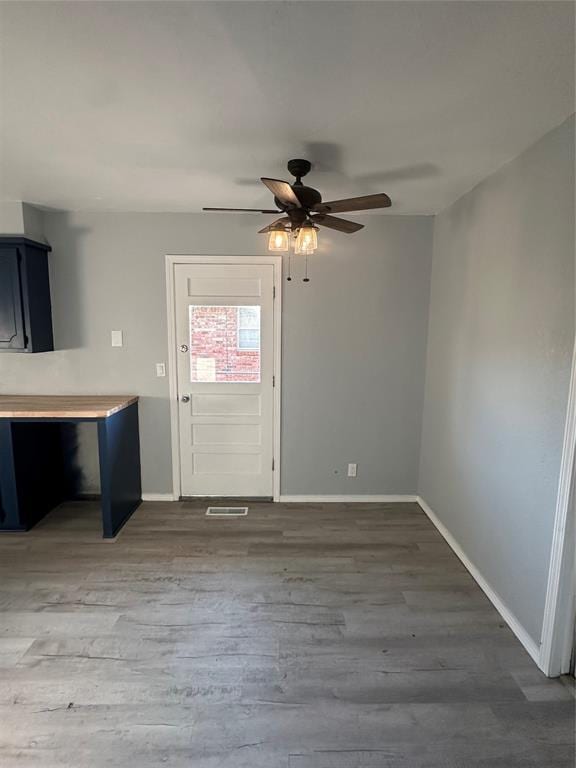 1501 W Watts St, El Reno, OK 73036 - entrance foyer with ceiling fan and wood finished floors