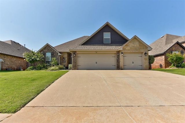 9920 NW 142nd St, Yukon, OK 73099 - craftsman house featuring a front yard, concrete driveway, brick siding, a shingled roof, and a garage