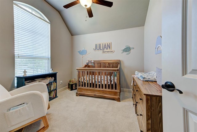 9920 NW 142nd St, Yukon, OK 73099 - bedroom featuring lofted ceiling, carpet flooring, ceiling fan, and a nursery area
