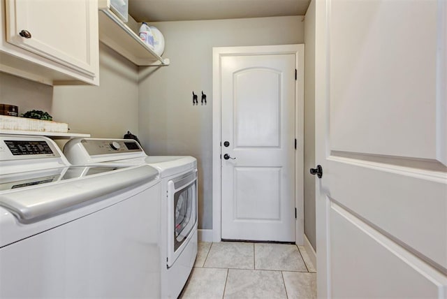 9920 NW 142nd St, Yukon, OK 73099 - laundry area with cabinet space, independent washer and dryer, and light tile patterned flooring