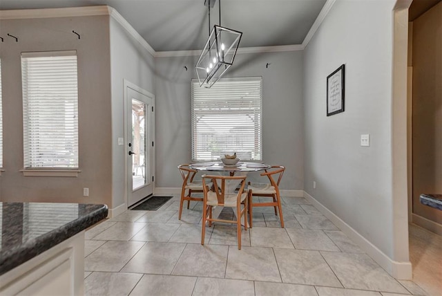 9920 NW 142nd St, Yukon, OK 73099 - dining area featuring crown molding and light tile patterned floors