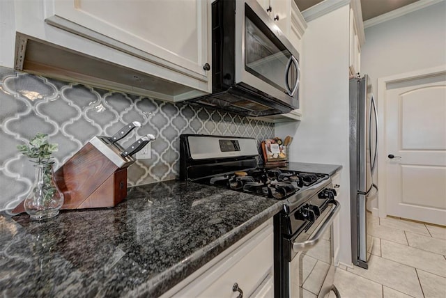 9920 NW 142nd St, Yukon, OK 73099 - kitchen featuring stainless steel appliances, white cabinetry, crown molding, and backsplash