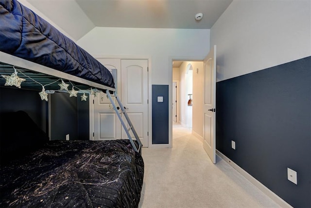 9920 NW 142nd St, Yukon, OK 73099 - carpeted bedroom featuring vaulted ceiling