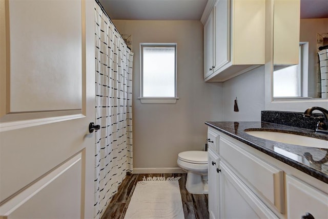 9920 NW 142nd St, Yukon, OK 73099 - bathroom with vanity, wood finished floors, and curtained shower