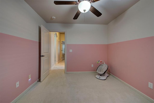 9920 NW 142nd St, Yukon, OK 73099 - spare room with light carpet, a smoke detector, and a ceiling fan