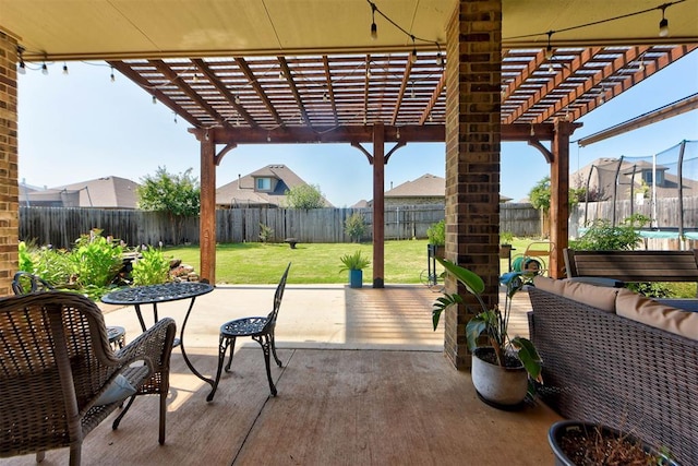 9920 NW 142nd St, Yukon, OK 73099 - fenced backyard with a pergola, a patio area, and a trampoline