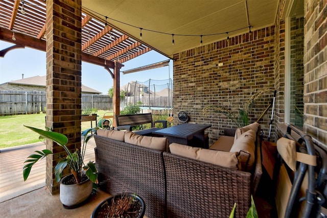 9920 NW 142nd St, Yukon, OK 73099 - fenced backyard featuring a trampoline, an outdoor hangout area, and a pergola