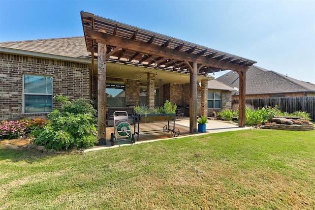 9920 NW 142nd St, Yukon, OK 73099 - rear view of property featuring brick siding, a pergola, a patio area, and a shingled roof