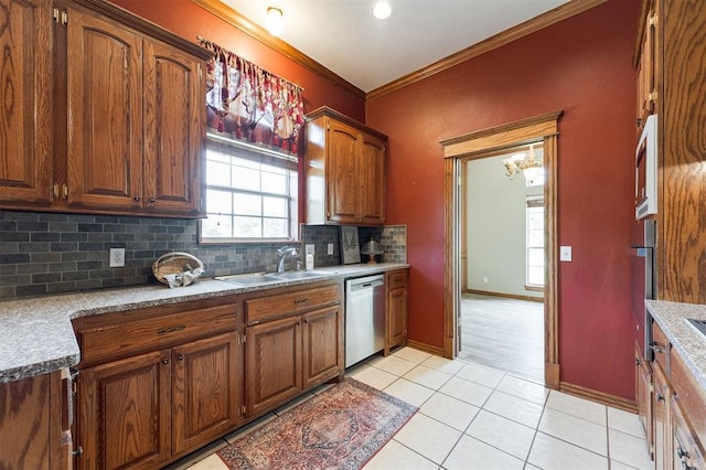 1723 Grey Hawk Rd, Edmond, OK 73003 - kitchen featuring dishwasher, tasteful backsplash, crown molding, white microwave, and light tile patterned flooring