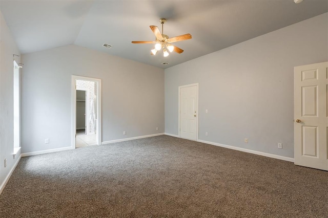 1723 Grey Hawk Rd, Edmond, OK 73003 - unfurnished bedroom featuring carpet, vaulted ceiling, and ceiling fan