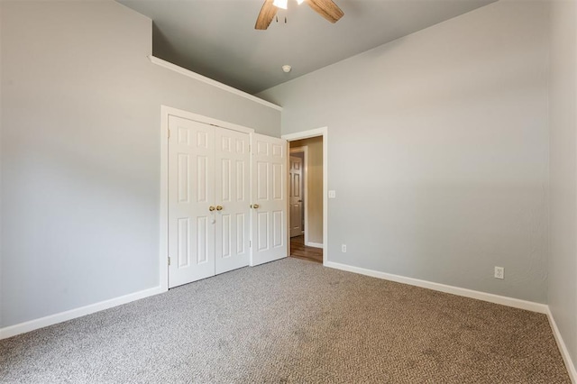 1723 Grey Hawk Rd, Edmond, OK 73003 - unfurnished bedroom with carpet floors, a closet, and ceiling fan