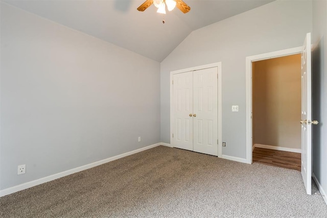 1723 Grey Hawk Rd, Edmond, OK 73003 - unfurnished bedroom with carpet floors, lofted ceiling, a closet, and a ceiling fan