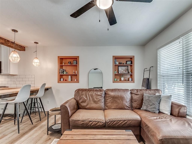 2244 Downing St, Oklahoma City, OK 73120 - living area featuring light wood-type flooring and a ceiling fan