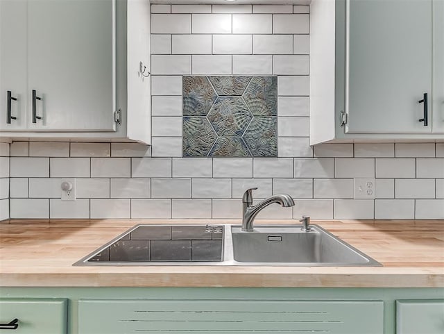 2244 Downing St, Oklahoma City, OK 73120 - kitchen with butcher block counters and tasteful backsplash