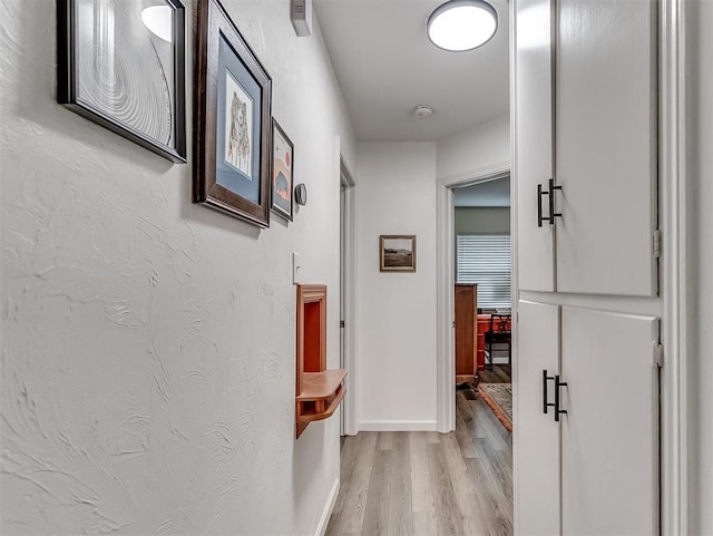 2244 Downing St, Oklahoma City, OK 73120 - hall with light wood finished floors and baseboards