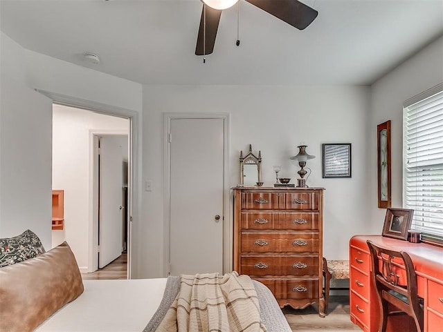 2244 Downing St, Oklahoma City, OK 73120 - bedroom with light wood-style floors and ceiling fan