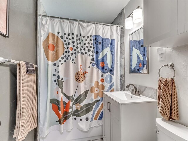 2244 Downing St, Oklahoma City, OK 73120 - full bathroom featuring vanity and toilet