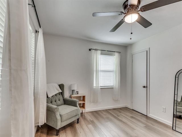 2244 Downing St, Oklahoma City, OK 73120 - living area featuring light wood-style flooring and ceiling fan