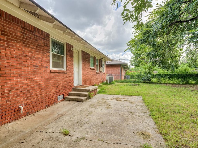 2244 Downing St, Oklahoma City, OK 73120 - view of yard featuring a patio area