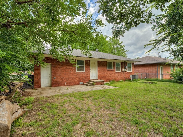 2244 Downing St, Oklahoma City, OK 73120 - ranch-style house featuring brick siding and a patio