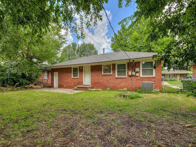 2244 Downing St, Oklahoma City, OK 73120 - single story home featuring brick siding and a patio area