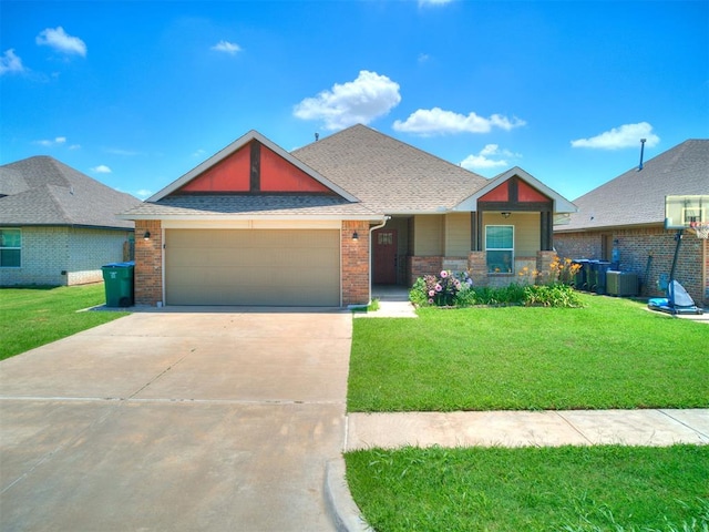 2208 Rivera Rd, Yukon, OK 73099 - craftsman house with a garage, concrete driveway, brick siding, and a front lawn
