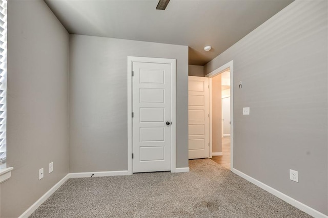 2208 Rivera Rd, Yukon, OK 73099 - unfurnished bedroom featuring carpet floors and baseboards