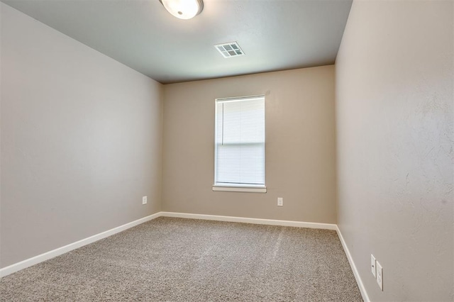 2208 Rivera Rd, Yukon, OK 73099 - empty room featuring carpet flooring and baseboards