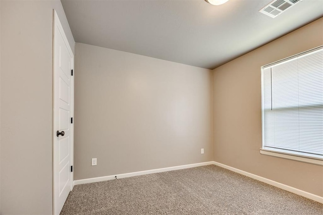 2208 Rivera Rd, Yukon, OK 73099 - unfurnished room with light carpet and plenty of natural light