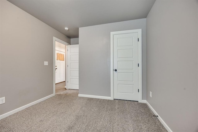 2208 Rivera Rd, Yukon, OK 73099 - unfurnished bedroom with carpet floors and baseboards