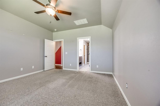 2208 Rivera Rd, Yukon, OK 73099 - unfurnished bedroom with carpet, ensuite bath, a ceiling fan, and vaulted ceiling