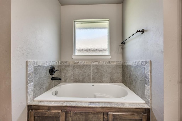 2208 Rivera Rd, Yukon, OK 73099 - full bathroom featuring a bath and a textured wall