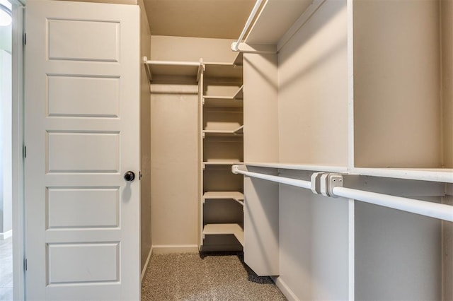 2208 Rivera Rd, Yukon, OK 73099 - spacious closet with carpet floors