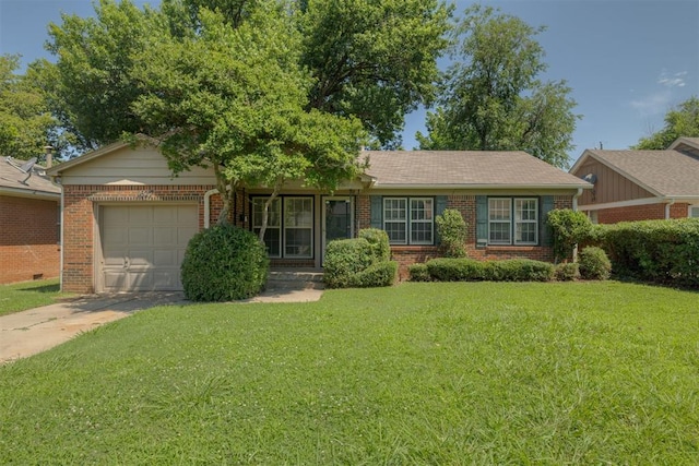 1627 Sheffield Rd, Oklahoma City, OK 73120 - ranch-style house featuring brick siding, a garage, a front yard, and concrete driveway