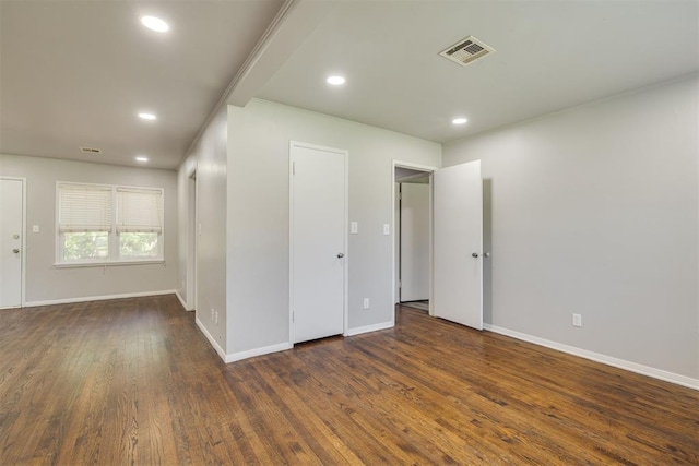 1627 Sheffield Rd, Oklahoma City, OK 73120 - empty room featuring dark wood-style floors and recessed lighting