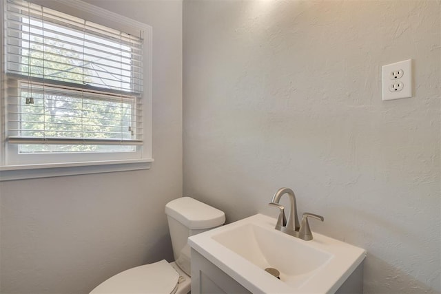 1627 Sheffield Rd, Oklahoma City, OK 73120 - half bathroom featuring vanity and a textured wall
